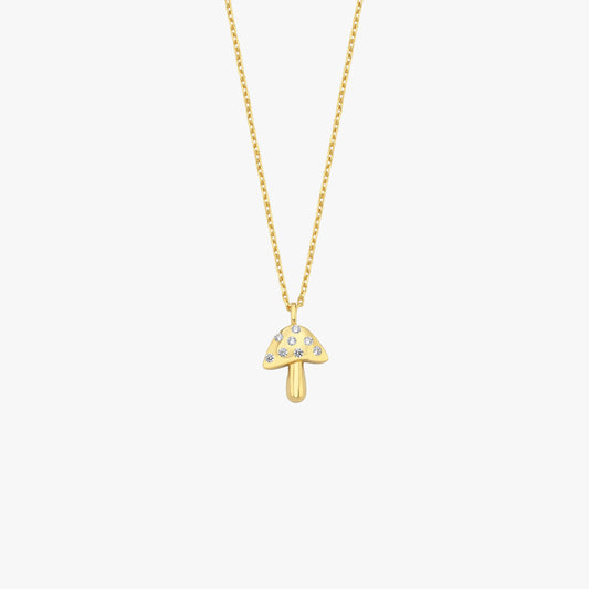 Gold mushroom pendant necklace with sparkling gemstones on a delicate chain, perfect for elegant fashion styling.