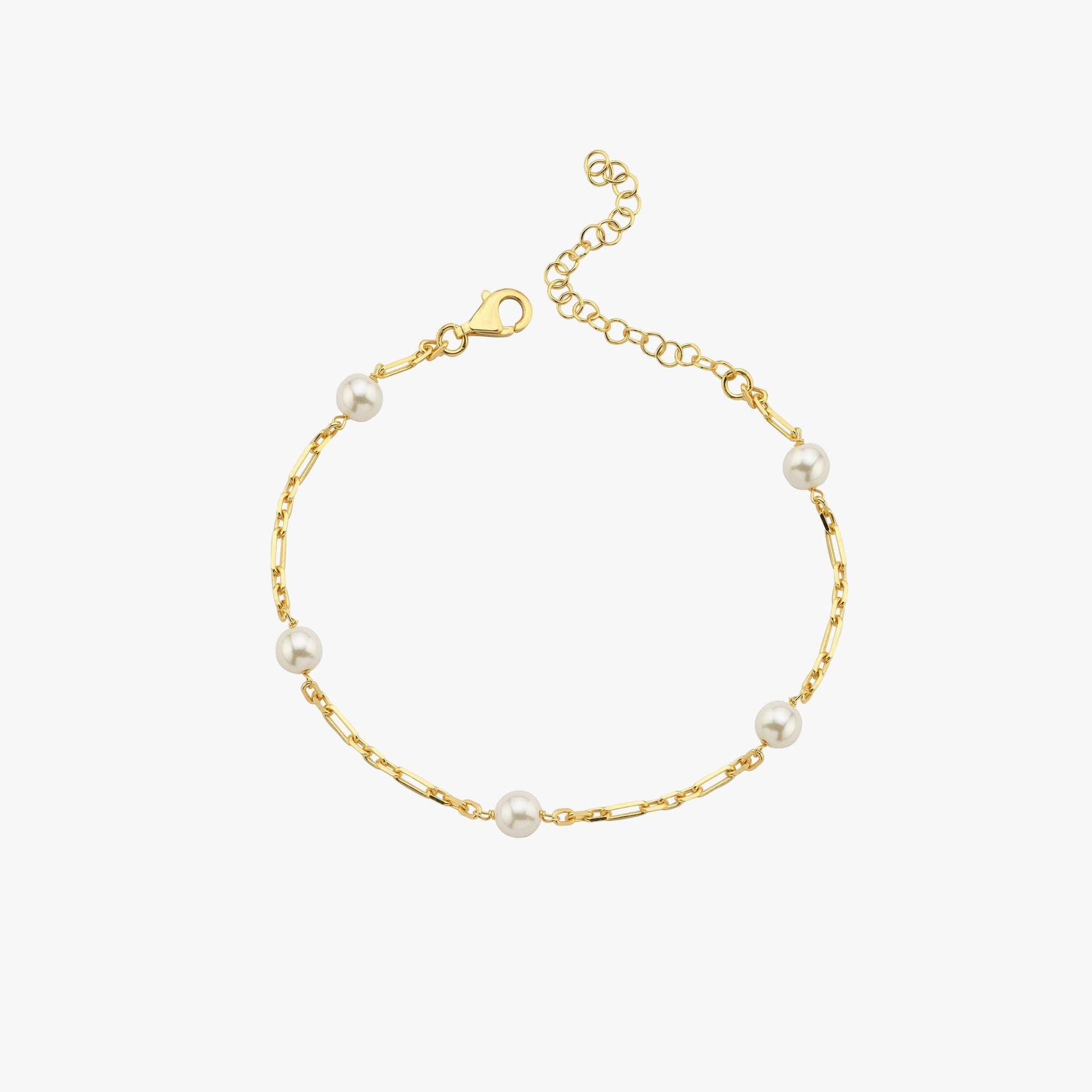 A minimalistic 18K gold vermeil bracelet with evenly spaced white pearls, elegantly laid out against a white background, displaying the simplicity and charm of the design.