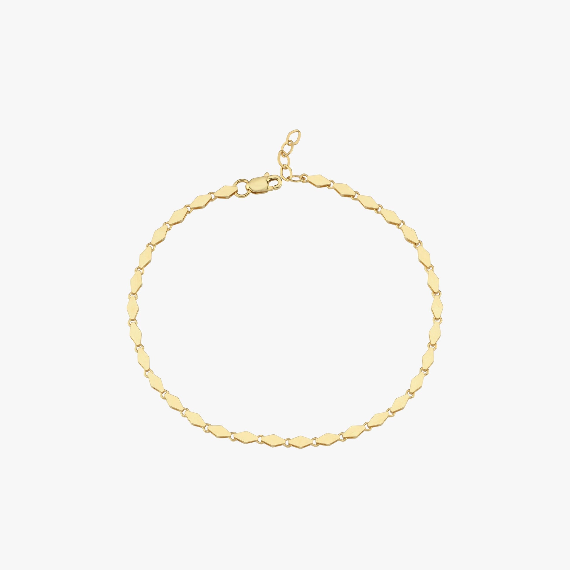 A standalone shot of the 14K gold bracelet, displaying its intricate chain links.