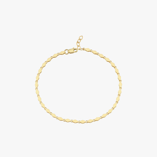 A standalone shot of the 14K gold bracelet, displaying its intricate chain links.