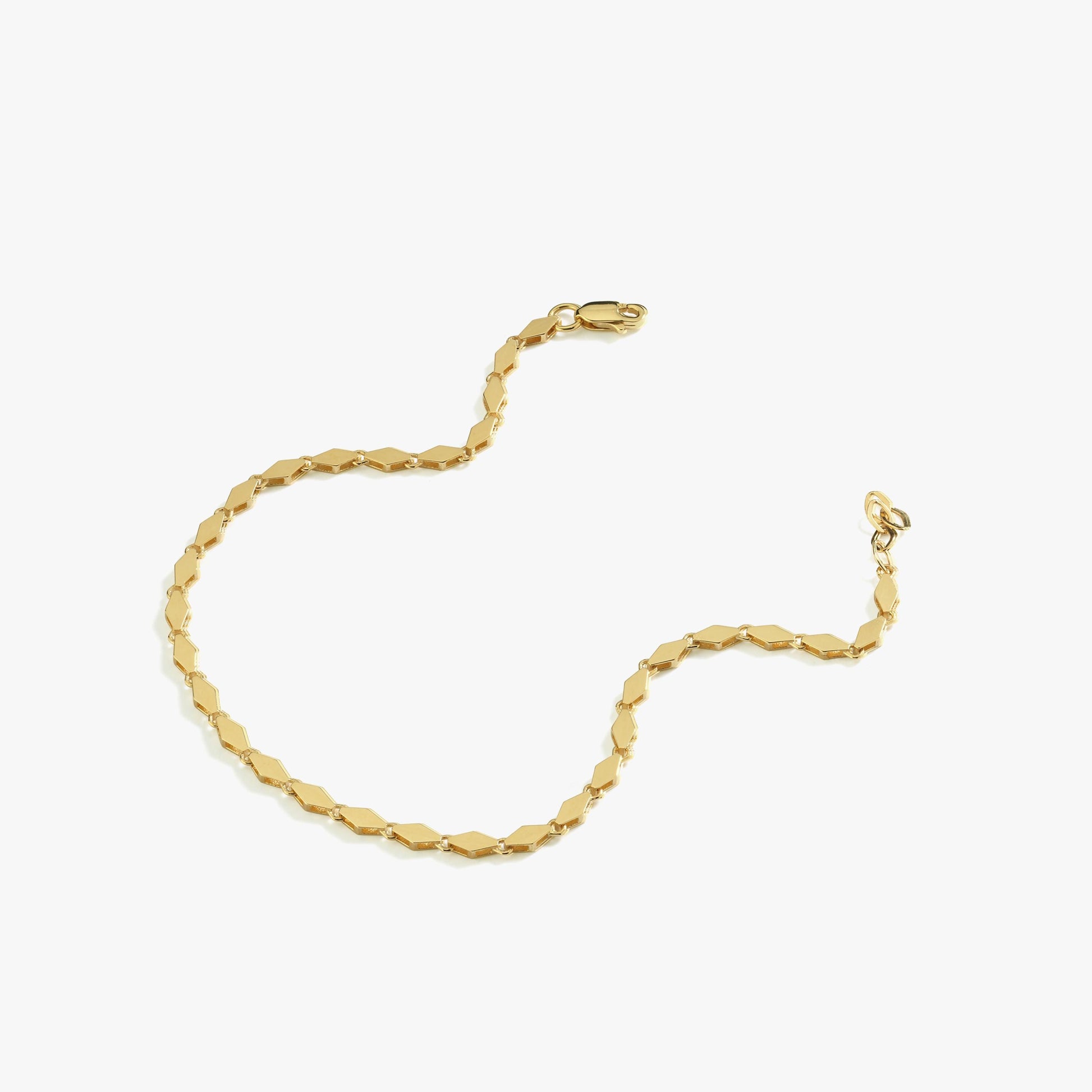 A selection of three different 14K gold bracelet chain styles, showcasing unique designs.