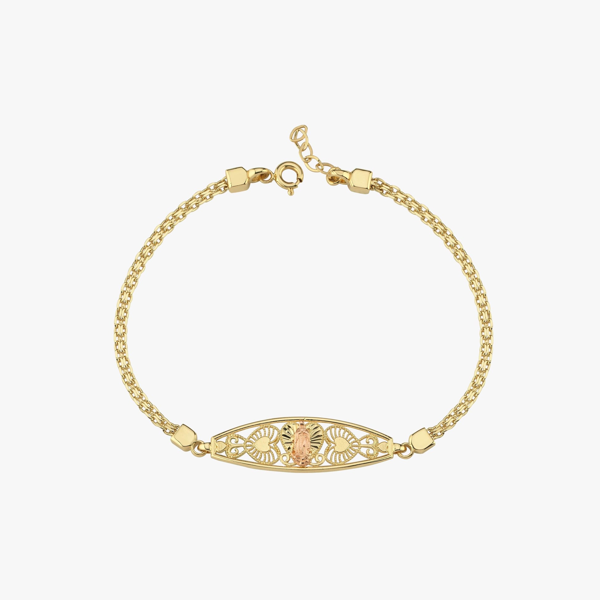 A close-up of the 14K solid gold Virgen de Guadalupe bracelet, emphasizing its detailed filigree pattern.