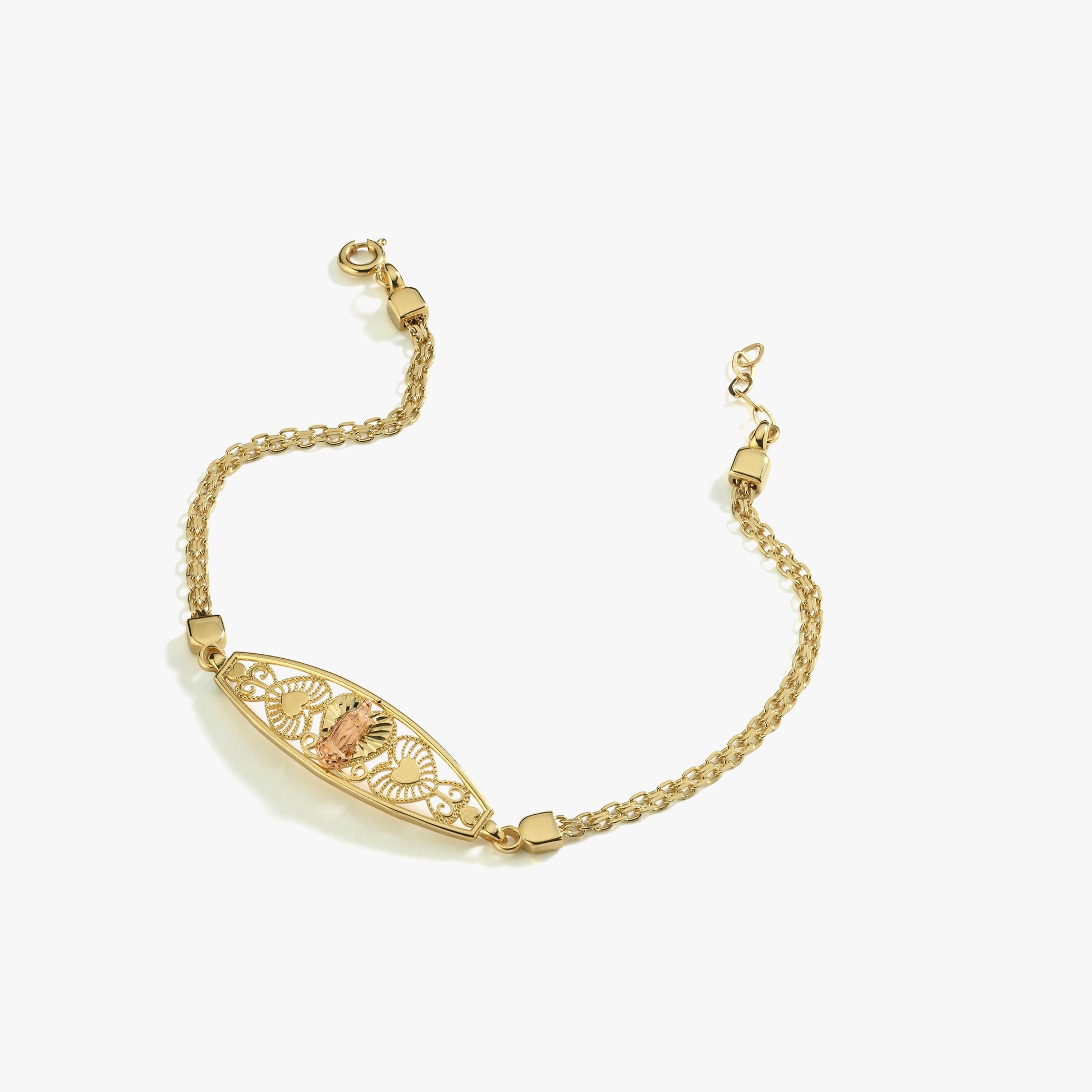 A 14K solid gold Virgen de Guadalupe bracelet laid flat, highlighting its fine craftsmanship and dual-chain design.