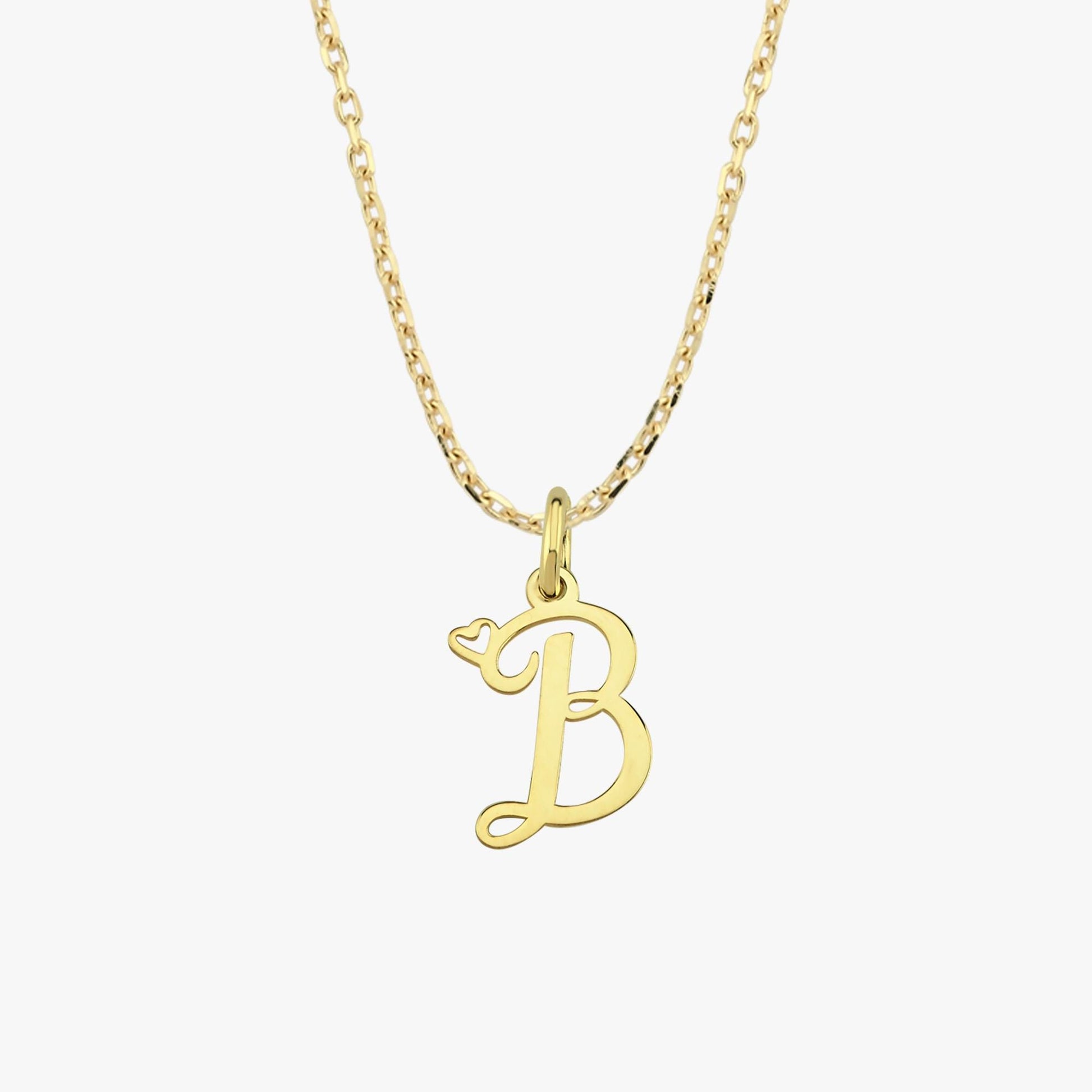 A 14K solid gold cursive initial necklace with a "B" charm is displayed against a plain, neutral background.