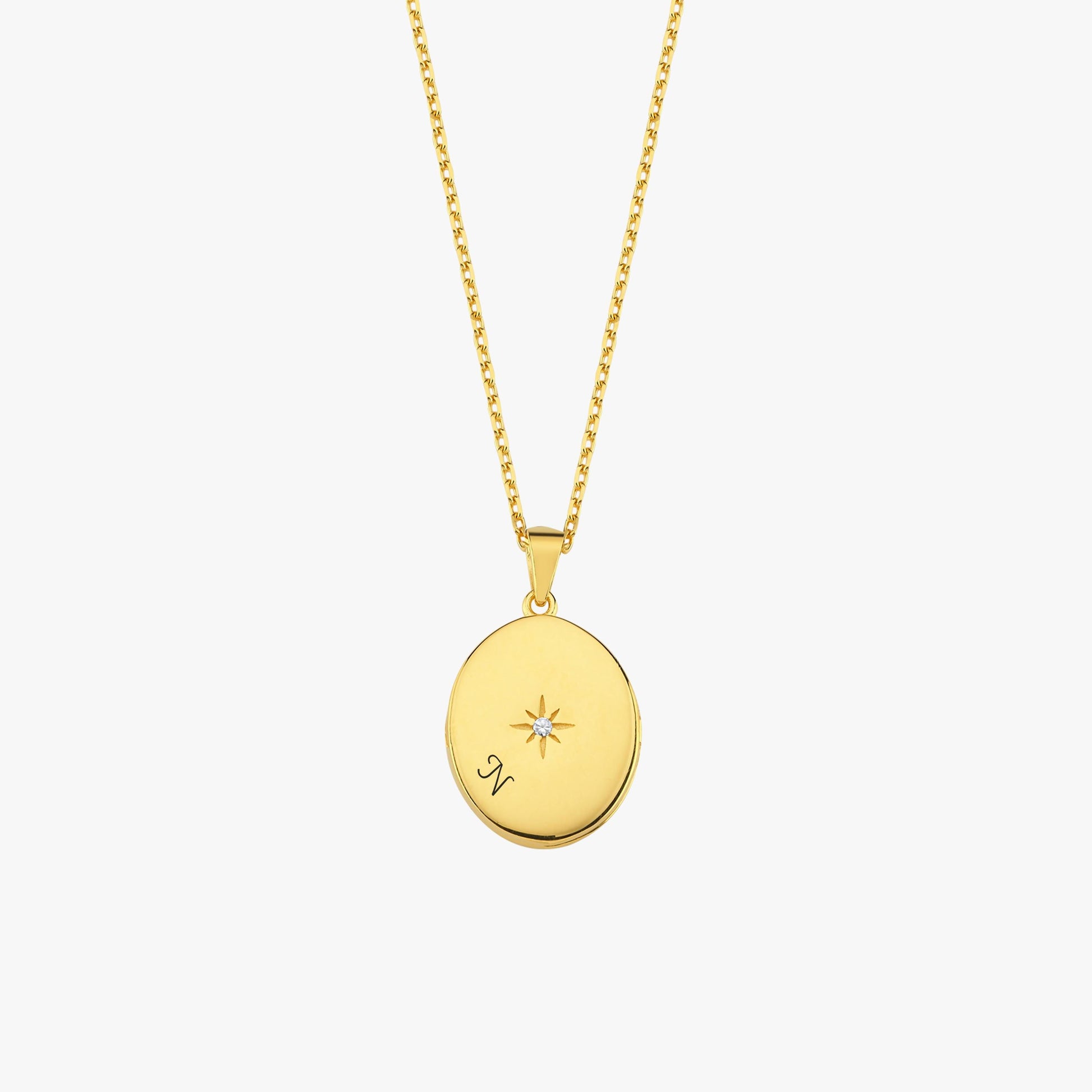 Front-facing view of the 18K Gold Vermeil Photo Locket Necklace showing a central star accent and elegant gold finish.