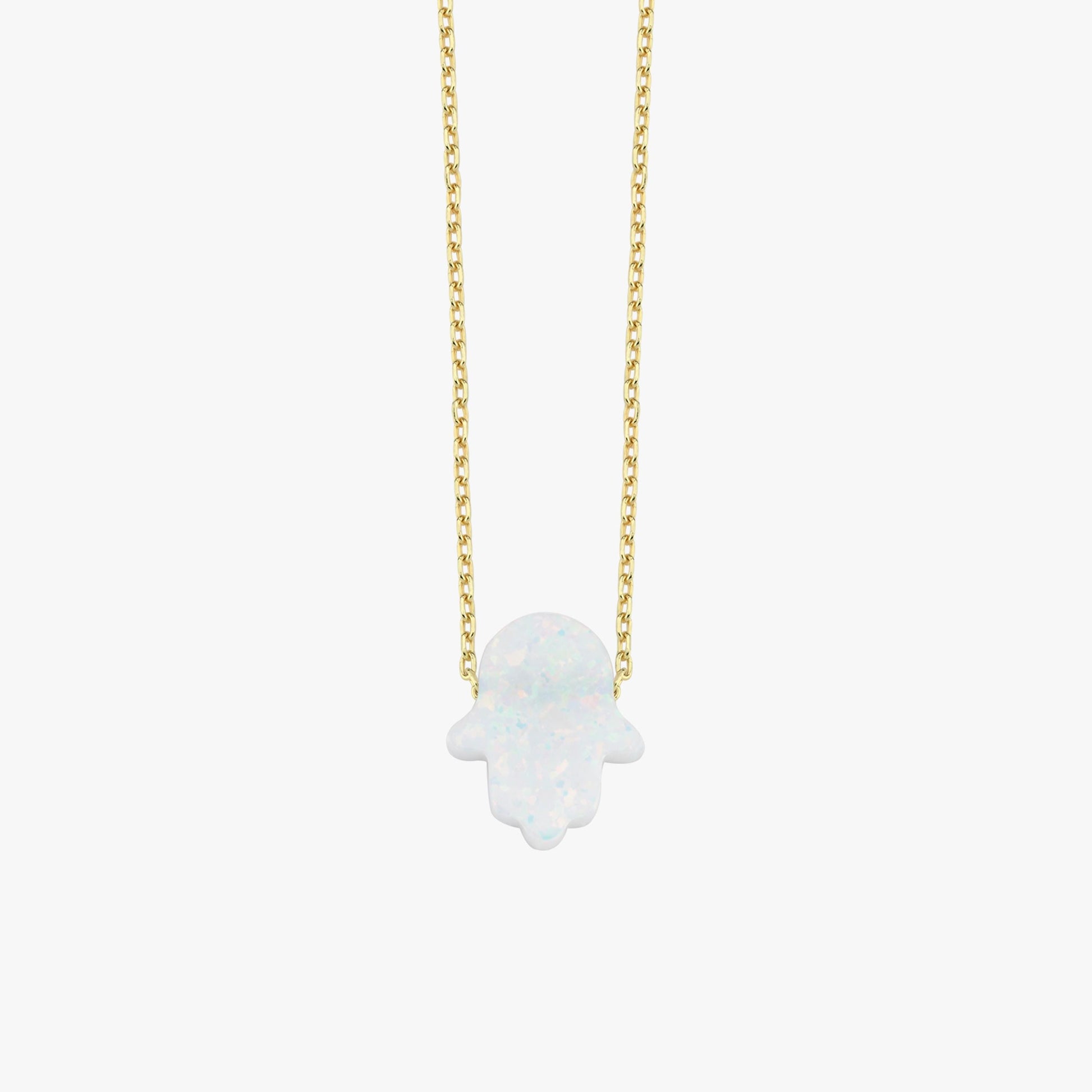 Product photo of the 14K solid gold opal Hamsa hand necklace, highlighting the sparkling opal charm.