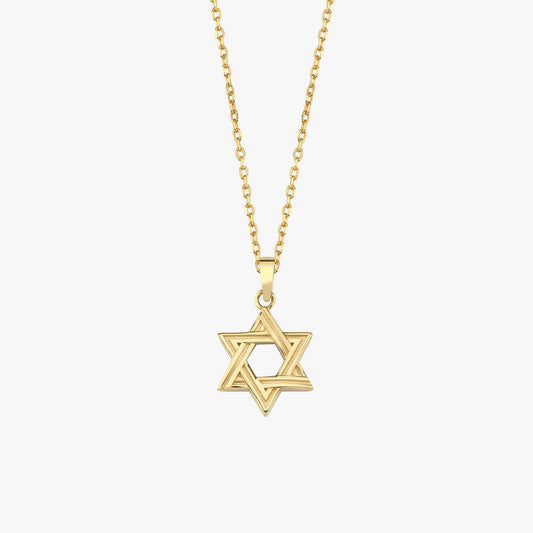 Close-up of 14K Solid Gold Magen David Necklace on collarbone.
