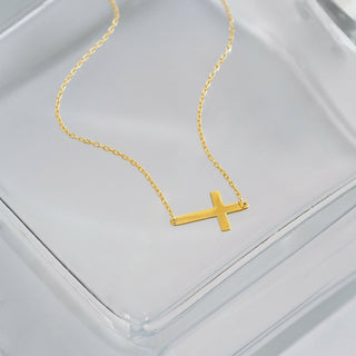 Timeless Charm: Elevate Your Style Game with a Sideways Cross Necklace