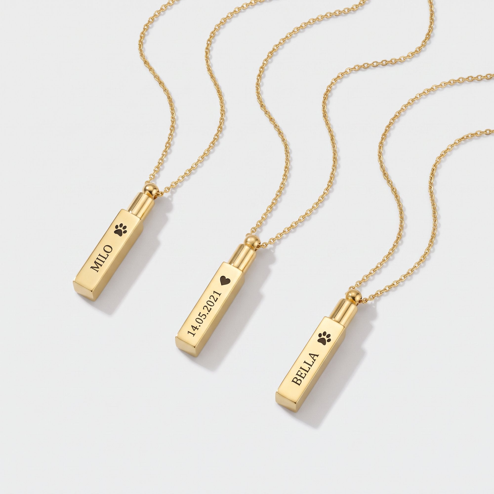Personalized gold cremation urn necklaces with engraved vertical bar pendants