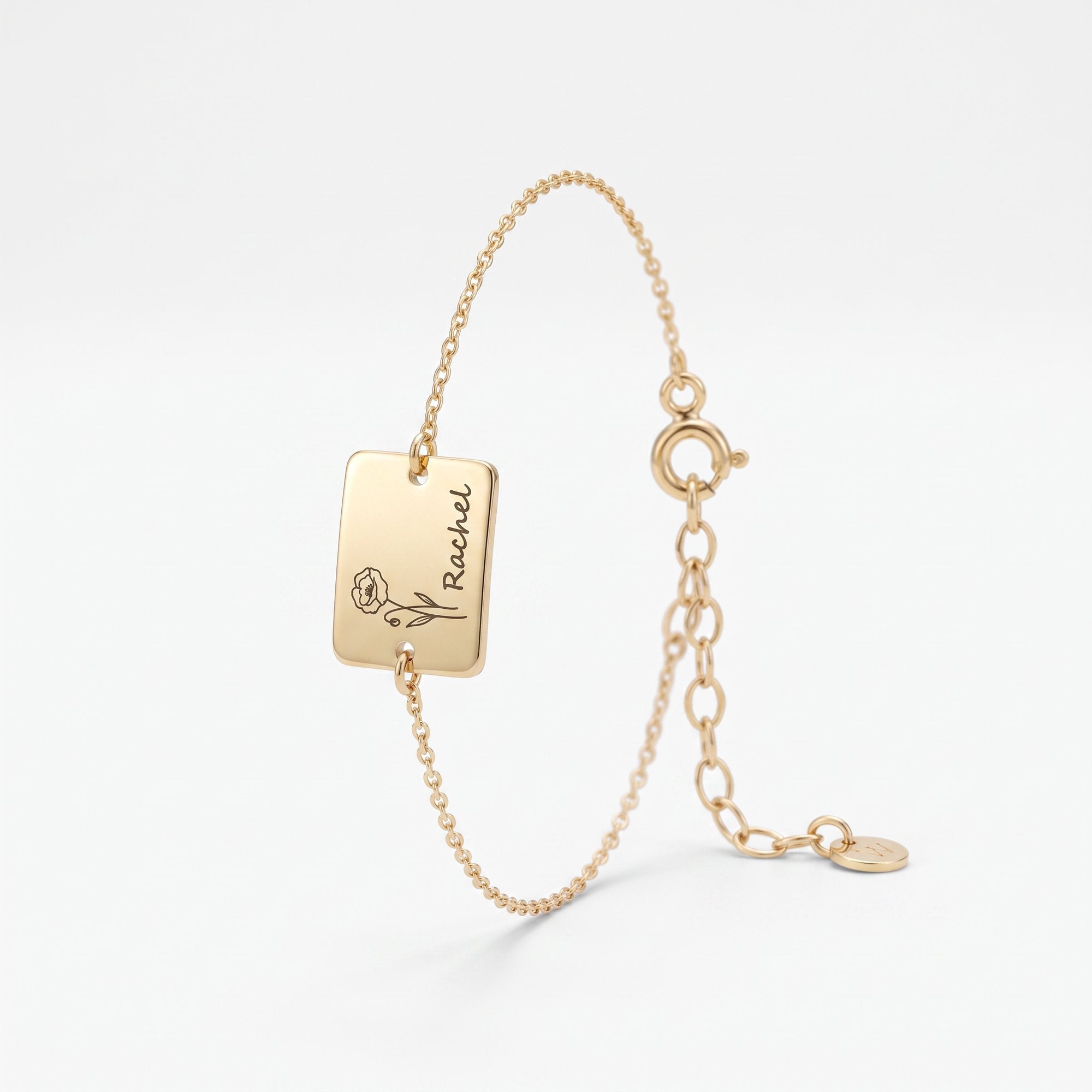 Gold birth flower bracelet with a square plate engraved with a birth flower and name, a personalized birth flower bracelet in 14K solid gold