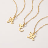 Gold custom letter necklaces with a butterfly on the initial pendant