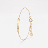Custom name bracelet with an engraved gold bar personalized with a name, a dainty gold name bracelet with extender