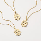 Engraved gold Dia de los Muertos sugar skull necklaces