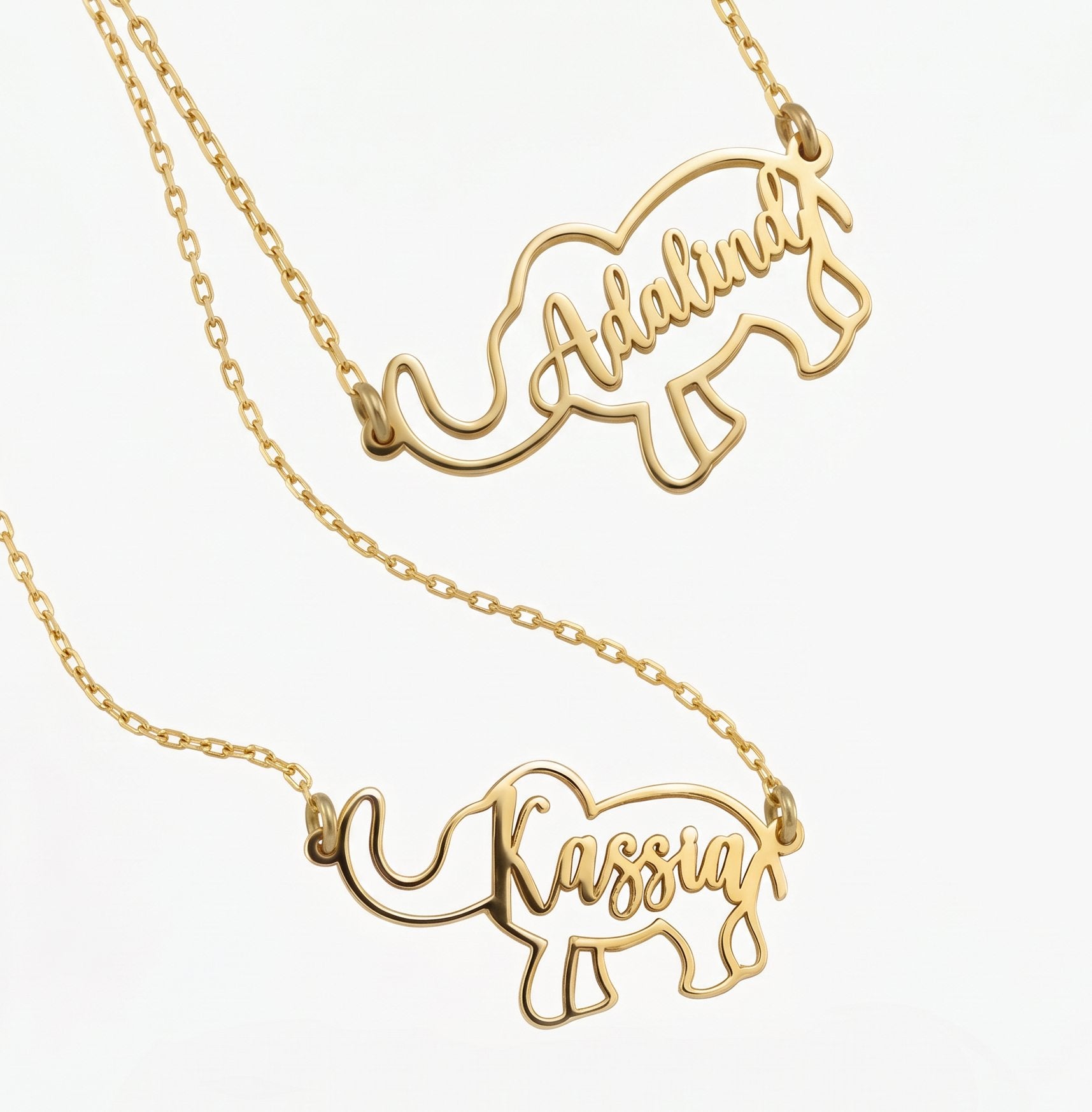 Personalized gold elephant name necklaces with cut-out names