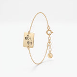 Custom handwriting bracelet in gold, a rectangle tag engraved with a child's drawing and I Love You note, kids drawing jewelry
