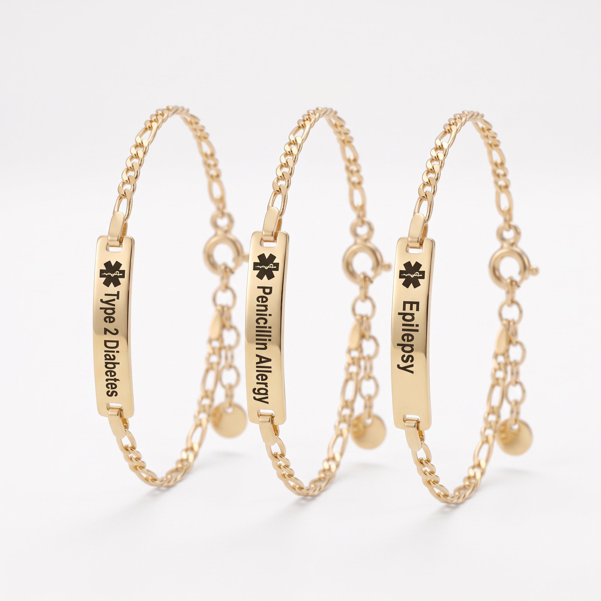 Gold medical alert bracelets with engraved ID bars for diabetes, allergy and epilepsy