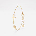 Gold Miraculous Medal bracelet with a sideways cross and oval Virgin Mary medal on a dainty cable chain with extender