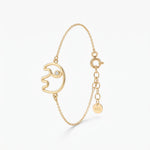 Gold elephant bracelet with an open elephant outline charm and a stone eye, a good luck bracelet in 18K gold vermeil