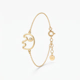 Gold elephant bracelet with an open elephant outline charm and a stone eye, a good luck bracelet in 18K gold vermeil