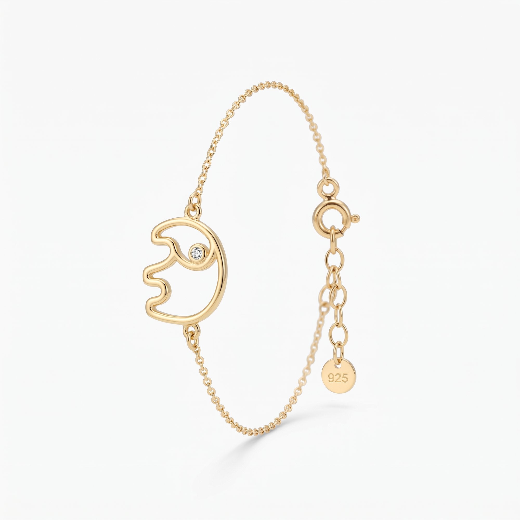 Gold elephant bracelet with an open elephant outline charm and a stone eye, a good luck bracelet in 18K gold vermeil