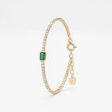 Emerald tennis bracelet in 18K gold vermeil, an emerald cut green stone in a bezel setting on a sparkling tennis chain