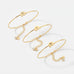 Gold elephant bangle bracelets with custom initials and birthstone charms
