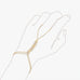 Gold hand chain bracelet with stacked chevron bars and cubic zirconia, a ring bracelet chain shown on a hand illustration