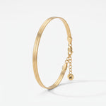 Gold herringbone bracelet, a flat snake chain bracelet in 18K gold vermeil with lobster clasp and extender