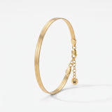 Gold herringbone bracelet, a flat snake chain bracelet in 18K gold vermeil with lobster clasp and extender