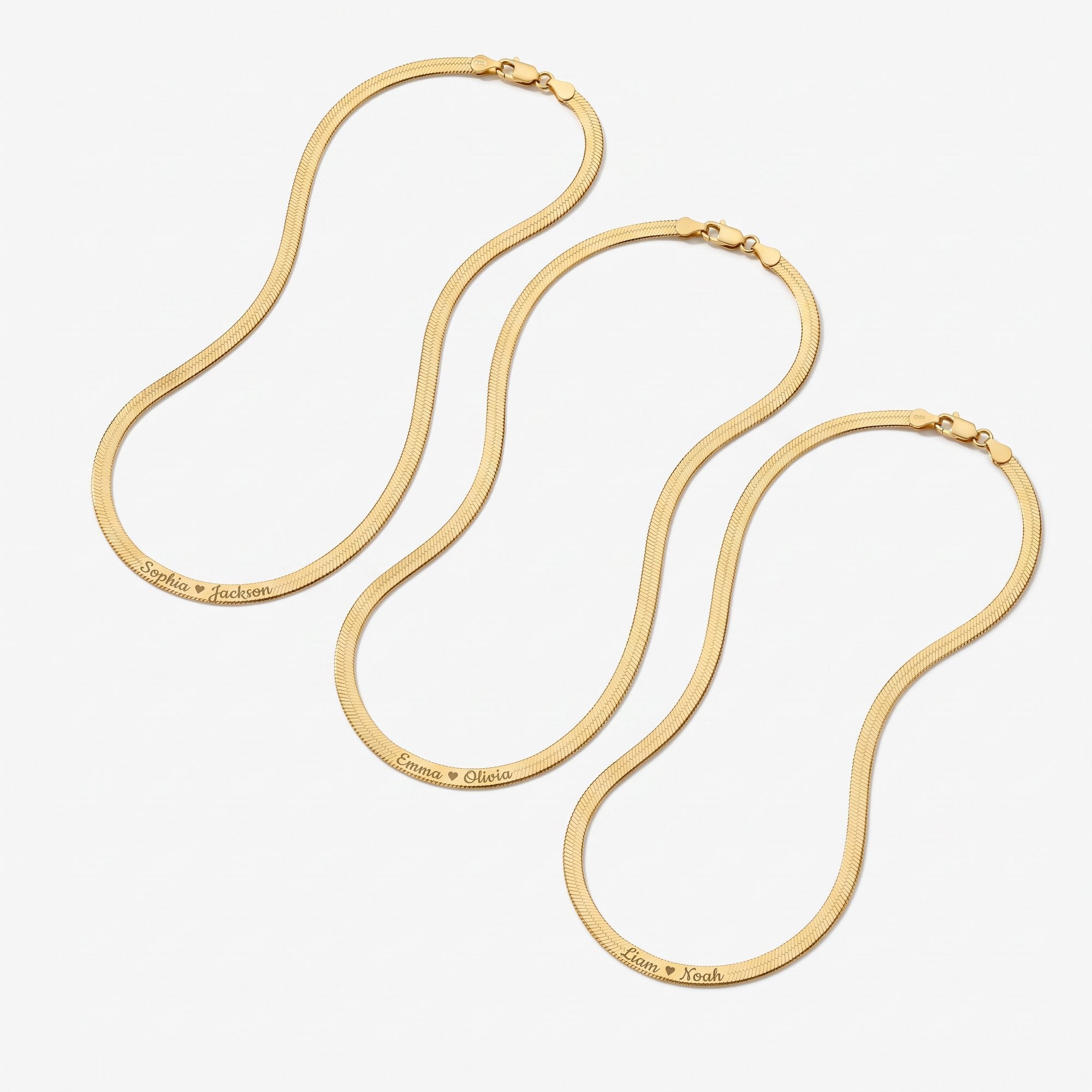 Personalized gold herringbone chain necklaces with engraved names