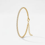 Gold tennis bracelet with a single row of round cubic zirconia stones in 18K gold vermeil, with lobster clasp and adjustable extender