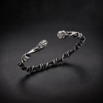 Men's bird skull cuff bracelet in 925 sterling silver with a twisted wire band