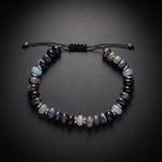 Men's beaded bracelet with blue sea sediment jasper and onyx natural stones on an adjustable cord