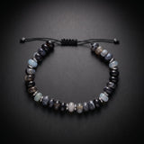 Men's beaded bracelet with blue sea sediment jasper and onyx natural stones on an adjustable cord