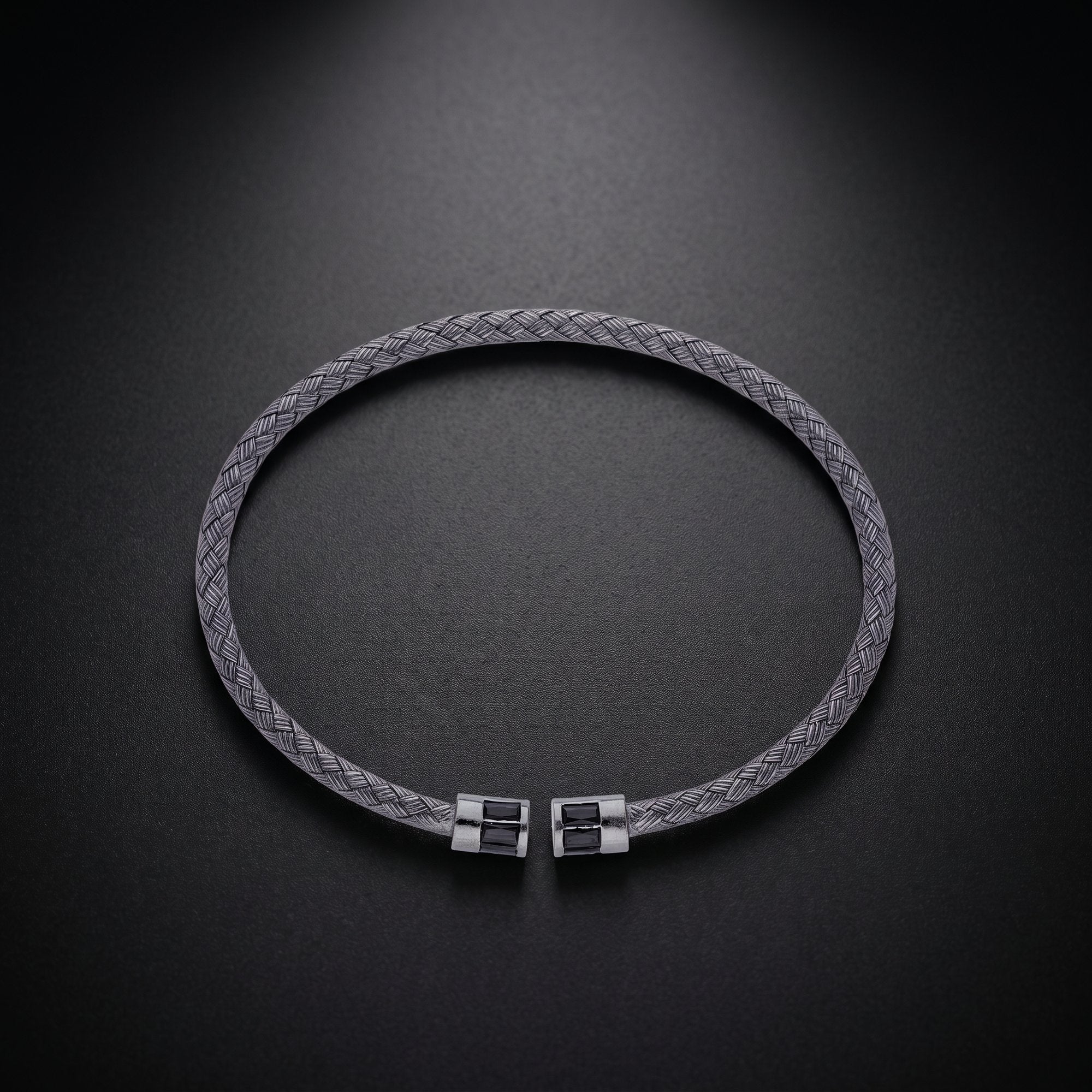 Men's braided cuff bracelet in 925 sterling silver with black end caps