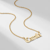 Solid gold old English cloister name necklace spelling Camila