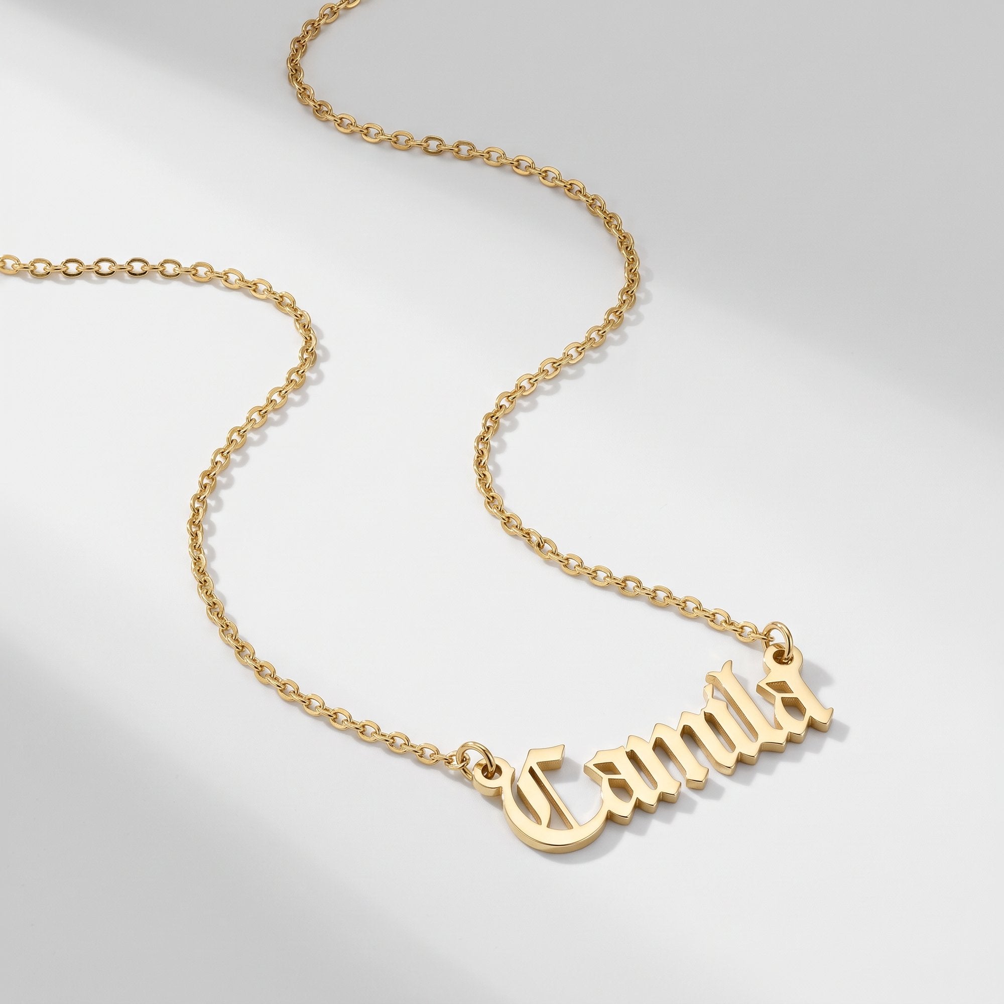 Solid gold old English cloister name necklace spelling Camila
