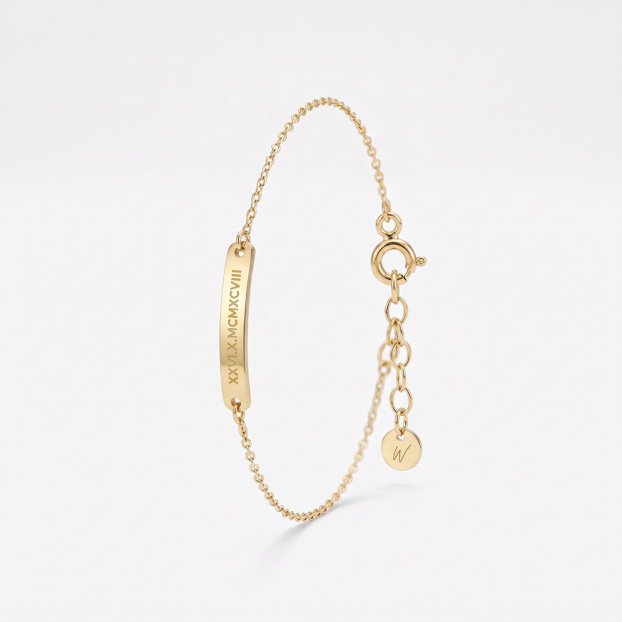 Engraved gold bar bracelet with a Roman numeral date, a personalized coordinates bracelet in 14K solid gold on a dainty chain