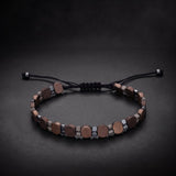 Handcrafted men's copper hematite natural stone bracelet on an adjustable black cord
