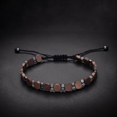 Handcrafted men's copper hematite natural stone bracelet on an adjustable black cord