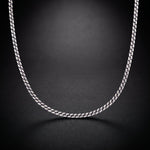 Men's Cuban chain necklace in sterling silver, a classic curb link chain