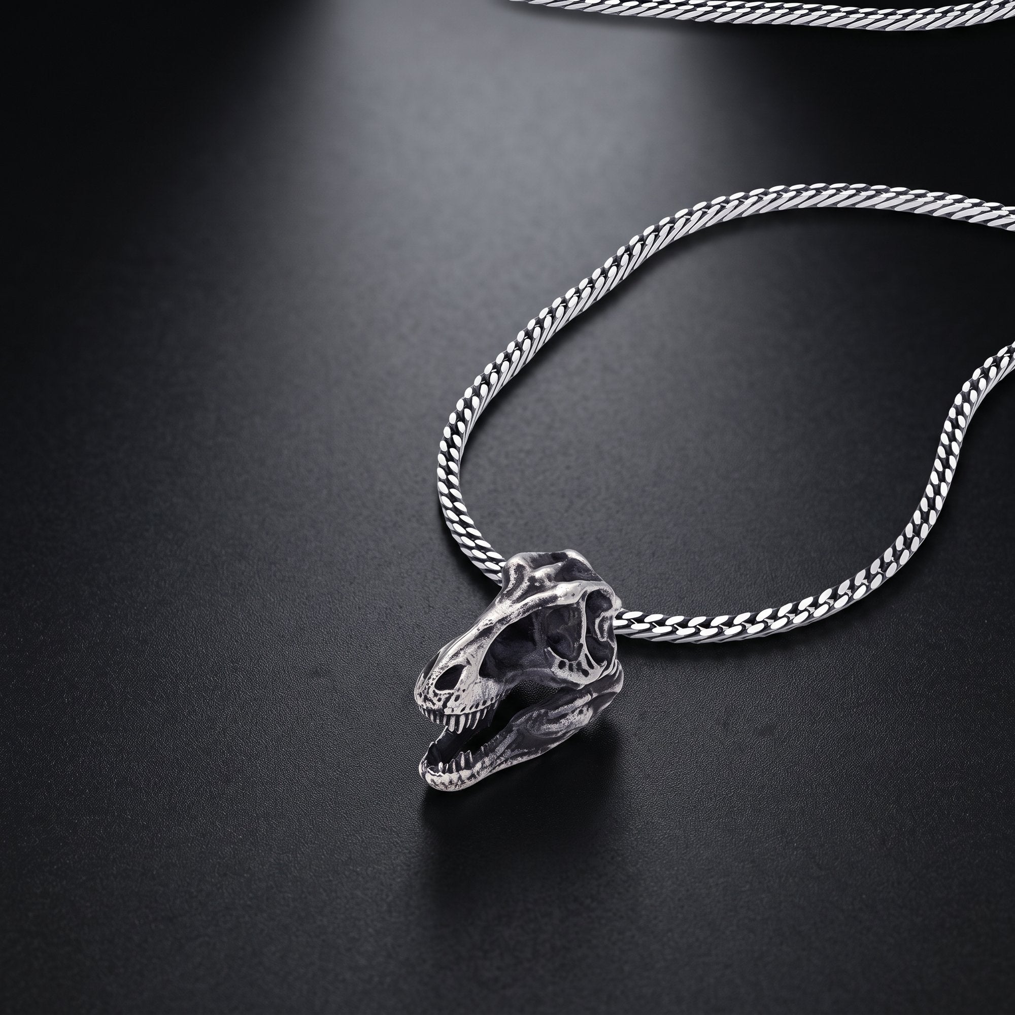 Men's dinosaur skull pendant in 925 sterling silver, a T-rex skull on a curb chain