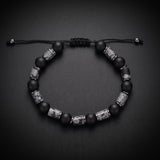 Men's grey map jasper and matte black onyx natural stone bracelet on an adjustable cord