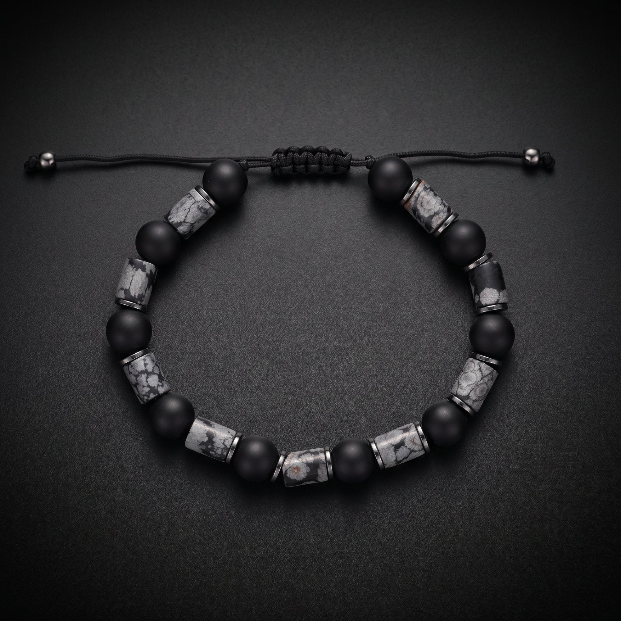 Men's grey map jasper and matte black onyx natural stone bracelet on an adjustable cord