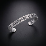 Men's hammered cross cuff bracelet in oxidized sterling silver
