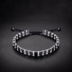 Men's hematite and white howlite natural stone bracelet on an adjustable cord