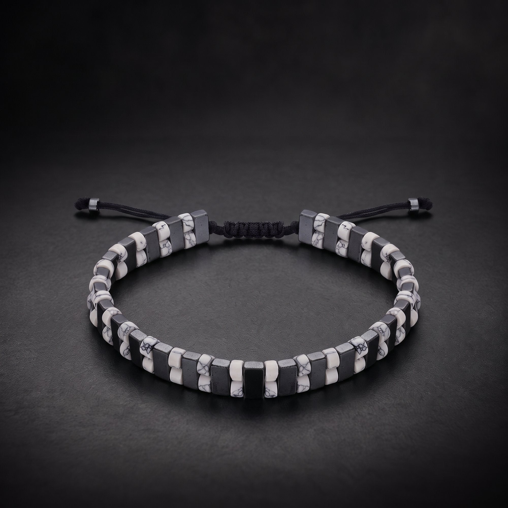 Men's hematite and white howlite natural stone bracelet on an adjustable cord