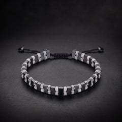 Men's hematite and white howlite natural stone bracelet on an adjustable cord