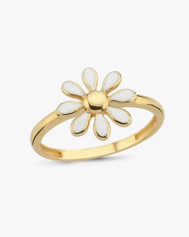 Gold ring featuring a daisy-like flower with white enamel petals, displayed against a white background.