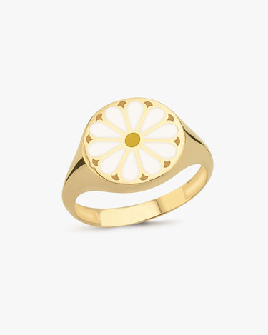 Close-up of a 14K solid gold ring featuring a white and yellow daisy design.